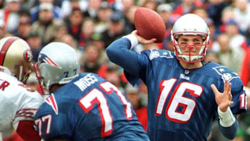 New England Patriots quarterback Scott Zolak (R) prepares to throw a pass in the second quarter of their game with the San Francisco 49ers at Foxboro Stadium 20 December. Filling in for the injured Drew Bledsoe and making his first start in three years, Zolak took the Patriots to a 24-21 victory, assuring them a spot in the playoffs. AFP PHOTO/JOHN MOTTERN (Photo by JOHN MOTTERN / AFP) (Photo by JOHN MOTTERN/AFP via Getty Images)