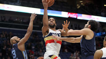 NEW ORLEANS, LOUISIANA - JANUARY 07: Jahlil Okafor #8 of the New Orleans Pelicans shoots the ball over Jevon Carter #3 of the Memphis Grizzliesat Smoothie King Center on January 07, 2019 in New Orleans, Louisiana. NOTE TO USER: User expressly acknowledges and agrees that, by downloading and or using this photograph, User is consenting to the terms and conditions of the Getty Images License Agreement. (Photo by Chris Graythen/Getty Images)