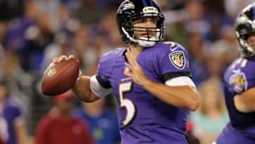 Aug 23, 2014; Baltimore, MD, USA; Baltimore Ravens quarterback Joe Flacco (5) looks to pass against the Washington Redskins at M&T Bank Stadium. Mandatory Credit: Mitch Stringer-USA TODAY Sports