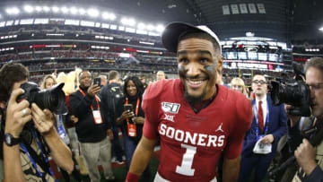 ARLINGTON, TX - DECEMBER 07: Jalen Hurts #1 of the Oklahoma Sooners celebrates the teams win over the Baylor Bears following the Big 12 Football Championship at AT&T Stadium on December 7, 2019 in Arlington, Texas. Oklahoma won 30-23. (Photo by Ron Jenkins/Getty Images)