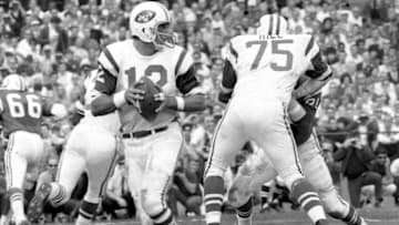 MIAMI - JANUARY 12: Quarterback Joe Namath #12 of the New York Jets drops back to throw a pass during Super Bowl III on January 12, 1969 against the Baltimore Colts at the Orange Bowl in Miami, Florida. (Photo by Kidwiler Collection/Diamond Images/Getty Images)