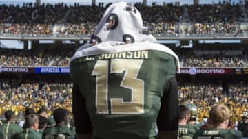 Dec 5, 2015; Waco, TX, USA; Baylor Bears quarterback Chris Johnson (13) watches from the sidelines after being injured against the Texas Longhorns during the game at McLane Stadium. Mandatory Credit: Jerome Miron-USA TODAY Sports