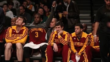 Mar 28, 2014; Brooklyn, NY, USA; The Dejected Cleveland Cavaliers players react from the bench during the second half against the Brooklyn Nets at Barclays Center. The Nets won 108-97. Mandatory Credit: Noah K. Murray-USA TODAY Sports