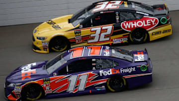 BROOKLYN, MI - JUNE 10: Denny Hamlin, driver of the #11 FedEx Freight Toyota, races with Matt DiBenedetto, driver of the #32 Can-Am/Wholey Ford, during the Monster Energy NASCAR Cup Series FireKeepers Casino 400 at Michigan International Speedway on June 10, 2018 in Brooklyn, Michigan. (Photo by Jeff Zelevansky/Getty Images)