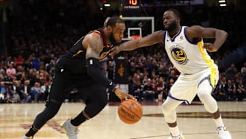 CLEVELAND, OH - JUNE 06: LeBron James #23 of the Cleveland Cavaliers drives to the basket defended by Draymond Green #23 of the Golden State Warriors in the second half during Game Three of the 2018 NBA Finals at Quicken Loans Arena on June 6, 2018 in Cleveland, Ohio. NOTE TO USER: User expressly acknowledges and agrees that, by downloading and or using this photograph, User is consenting to the terms and conditions of the Getty Images License Agreement. (Photo by Gregory Shamus/Getty Images)