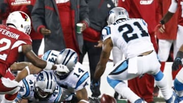 Jan 24, 2016; Charlotte, NC, USA; Carolina Panthers defensive back Teddy Williams (21) chases a loose ball during the second quarter against the Arizona Cardinals in the NFC Championship football game at Bank of America Stadium. Mandatory Credit: Jason Getz-USA TODAY Sports