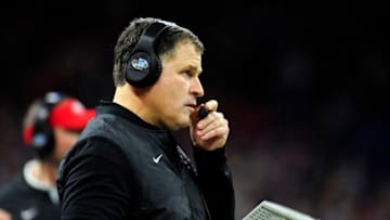 INDIANAPOLIS, IN - DECEMBER 01: Ohio State Buckeyes Associate Head Coach for Defense Greg Schiano talks on his headset during the Big Ten Conference Championship college football game between the Northwestern Wildcats and the Ohio State Buckeyes on December 1, 2018, at Lucas Oil Stadium in Indianapolis, Indiana. (Photo by Michael Allio/Icon Sportswire via Getty Images)