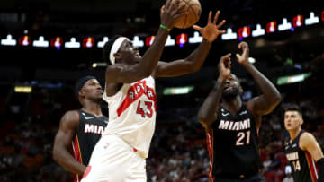 Pascal Siakam #43 of the Toronto Raptors drives past Jimmy Butler #22 and Dewayne Dedmon #21 of the Miami Heat (Photo by Megan Briggs/Getty Images)