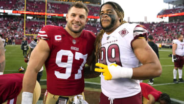 SANTA CLARA, CALIFORNIA - DECEMBER 24: Chase Young #99 of the Washington Commanders pose with Nick Bosa #97 of the San Francisco 49ers after the game at Levi's Stadium on December 24, 2022 in Santa Clara, California. (Photo by Thearon W. Henderson/Getty Images)