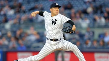 May 10, 2016; Bronx, NY, USA; New York Yankees starting pitcher Masahiro Tanaka (19) pitches against the Kansas City Royals during the second inning at Yankee Stadium. Mandatory Credit: Brad Penner-USA TODAY Sports