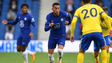 Chelsea's Moroccan midfielder Hakim Ziyech (C) runs with the ball during the pre-season friendly football match between Brighton and Hove Albion and Chelsea at the American Express Community Stadium in Brighton, southern England on August 29, 2020. - The game is a 'pilot' event where a small number of fans will be present on a socially-distanced basis. The aim is to get fans back into stadiums in the Premier League by October. (Photo by Glyn KIRK / AFP) (Photo by GLYN KIRK/AFP via Getty Images)
