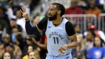 WASHINGTON, DC - MARCH 16: Mike Conley #11 of the Memphis Grizzlies celebrates after hitting a three pointer against the Washington Wizards in the first half at Capital One Arena on March 16, 2019 in Washington, DC. NOTE TO USER: User expressly acknowledges and agrees that, by downloading and or using this photograph, User is consenting to the terms and conditions of the Getty Images License Agreement. (Photo by Rob Carr/Getty Images)