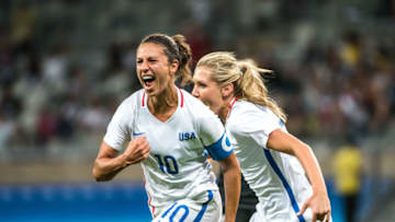 Carli Lloyd (L) of the USA celebrates her goal during a Rio 2016 Olympic Games first round Group G women's football match United States vs New Zealand at the Mineirao stadium in Belo Horizonte, Brazil on August 3, 2016. / AFP / GUSTAVO ANDRADE (Photo credit should read GUSTAVO ANDRADE/AFP/Getty Images)