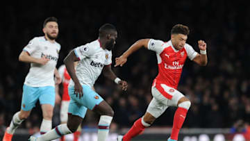 LONDON, ENGLAND - APRIL 05: Alex Oxlade-Chamberlain of Arsenal takes on Arthur Masuaku of West Ham during the Premier League match between Arsenal and West Ham United at Emirates Stadium on April 5, 2017 in London, England. (Photo by David Price/Arsenal FC via Getty Images)