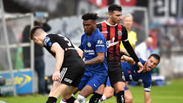DUBLIN, IRELAND - JULY 10: Dujon Sterling of Chelsea is challenged by Darragh Leahy of Bohemains FC during the Pre-Season Friendly match between Bohemians FC and Chelsea FC at Dalymount Park on July 10, 2019 in Dublin, Ireland. (Photo by Charles McQuillan/Getty Images)