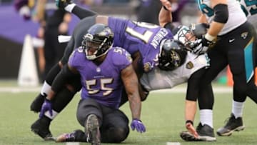 Dec 14, 2014; Baltimore, MD, USA; Baltimore Ravens tackle Timmy Jernigan (97) tackles Jacksonville Jaguars quarterback Blake Bortles (5) at M&T Bank Stadium. Mandatory Credit: Mitch Stringer-USA TODAY Sports