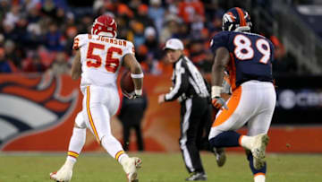 DENVER - JANUARY 03: Linebacker Derrick Johnson #56 of the Kansas City Chiefs intercepts a pass by Kyle Orton of the Denver Broncos and returns it 60 yards for a touchdown as Daniel Graham #89 of the Broncos pursues in the fourth quarter during NFL action at Invesco Field at Mile High on January 3, 2010 in Denver, Colorado. Johnson returned two Orton interceptions for touchdowns in the game as the Chiefs defeated the Broncos 44-24. (Photo by Doug Pensinger/Getty Images)