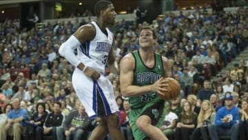 Feb 22, 2014; Sacramento, CA, USA; Boston Celtics center Kris Humphries (43) drives to the basket against Sacramento Kings power forward Jason Thompson (34) during the first quarter at Sleep Train Arena. Mandatory Credit: Ed Szczepanski-USA TODAY Sports