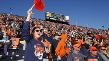 AUBURN, AL - OCTOBER 22: A young fan of the Auburn Tigers cheers as the team takes the field before the game against the Arkansas Razorbacks at Jordan-Hare Stadium on October 22, 2016 in Auburn, Alabama. (Photo by Joe Robbins/Getty Images)