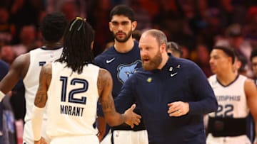 Memphis Grizzlies guard Ja Morant and head coach Taylor Jenkins-Mandatory Credit: Mark J. Rebilas-USA TODAY Sports
