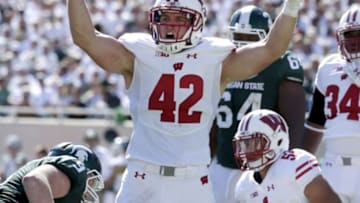 Sep 24, 2016; East Lansing, MI, USA; Wisconsin linebacker T.J. Watt (42) reacts after a teammate sacked Michigan State quarterback Tyler O