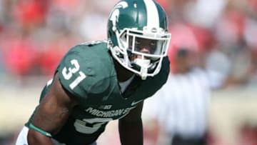 Sep 14, 2013; East Lansing, MI, USA; Michigan State Spartans cornerback Darqueze Dennard (31) prepares for the snap of the ball during the first half in a game between the Michigan State Spartans and the Youngstown State Penguins at Spartan Stadium. Mandatory Credit: Mike Carter-USA TODAY Sports