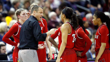 COLUMBUS, OH - MARCH 30: Head coach Jeff Walz of the Louisville Cardinals speaks to his team against the Mississippi State Lady Bulldogs during the first half in the semifinals of the 2018 NCAA Women's Final Four at Nationwide Arena on March 30, 2018 in Columbus, Ohio. (Photo by Andy Lyons/Getty Images)