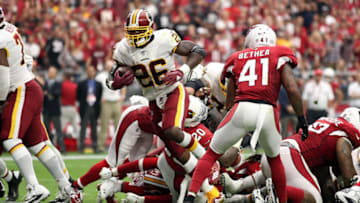 GLENDALE, AZ - SEPTEMBER 09: Running back Adrian Peterson #26 of the Washington Redskins scores a one-yard touchdown during the second quarter against the Arizona Cardinals at State Farm Stadium on September 9, 2018 in Glendale, Arizona. (Photo by Christian Petersen/Getty Images)