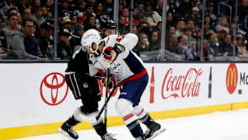 LOS ANGELES, CA - FEBRUARY 18: Los Angeles Kings defenceman Matt Roy (81) battles Washington Capitals right wing Tom Wilson (43) for the puck during the game on February 18, 2019, at Staples Center in Los Angeles, CA. (Photo by Adam Davis/Icon Sportswire via Getty Images)