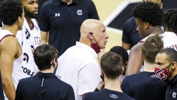 Jan 6, 2021; Columbia, South Carolina, USA; South Carolina Gamecocks head coach Frank Martin talks with forward Jalyn McCreary (4) during the first half against the Texas A&M Aggies at Colonial Life Arena. Mandatory Credit: Jeff Blake-USA TODAY Sports