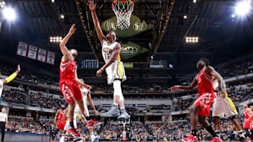 INDIANAPOLIS, IN - JANUARY 29: Myles Turner #33 of the Indiana Pacers blocks a shot against Ryan Anderson #3 of the Houston Rockets in the second half of the game at Bankers Life Fieldhouse on January 29, 2017 in Indianapolis, Indiana. The Pacers defeated the Rockets 120-101. NOTE TO USER: User expressly acknowledges and agrees that, by downloading and or using the photograph, User is consenting to the terms and conditions of the Getty Images License Agreement. (Photo by Joe Robbins/Getty Images)