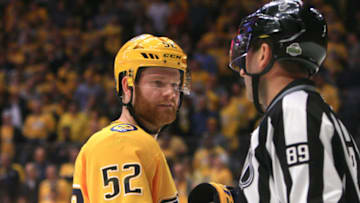 NASHVILLE, TN - APRIL 12: Nashville Predators defenseman Matt Irwin (52) talks with linesman Steve Miller (89) during Game One of Round One of the Stanley Cup Playoffs between the Nashville Predators and Colorado Avalanche, held on April 12, 2018, at Bridgestone Arena in Nashville, Tennessee. (Photo by Danny Murphy/Icon Sportswire via Getty Images)