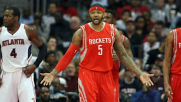 Mar 3, 2015; Atlanta, GA, USA; Houston Rockets forward Josh Smith (5) reacts after a foul call against the Atlanta Hawks in the first quarter at Philips Arena. Mandatory Credit: Brett Davis-USA TODAY Sports