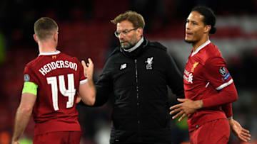 LIVERPOOL, ENGLAND - APRIL 04: Jordan Henderson of Liverpool and Jurgen Klopp, Manager of Liverpool celebrate victory after the UEFA Champions League Quarter Final Leg One match between Liverpool and Manchester City at Anfield on April 4, 2018 in Liverpool, England. (Photo by Shaun Botterill/Getty Images)