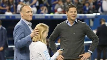 TORONTO, CANADA - APRIL 8: President and CEO Mark Shapiro of the Toronto Blue Jays with his daughter Sierra and general manager Ross Atkins on the field before the start of MLB game action against the Boston Red Sox on April 8, 2016 at Rogers Centre in Toronto, Ontario, Canada. (Photo by Tom Szczerbowski/Getty Images)