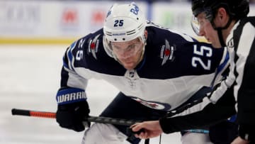 Mar 30, 2022; Buffalo, New York, USA; Winnipeg Jets center Paul Stastny (25) waits for the face-off during the third period against the Buffalo Sabres at KeyBank Center. Mandatory Credit: Timothy T. Ludwig-USA TODAY Sports