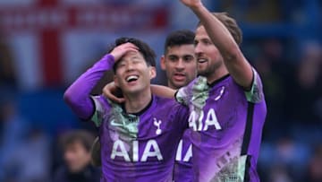 Tottenham Hotspur's South Korean striker Son Heung-Min (L) celebrates with Tottenham Hotspur's English striker Harry Kane (R) after scoring their fourth goal from a pass by Kane during the English Premier League football match between Leeds United and Tottenham Hotspur at Elland Road in Leeds, northern England on February 26, 2022. - RESTRICTED TO EDITORIAL USE. No use with unauthorized audio, video, data, fixture lists, club/league logos or 'live' services. Online in-match use limited to 120 images. An additional 40 images may be used in extra time. No video emulation. Social media in-match use limited to 120 images. An additional 40 images may be used in extra time. No use in betting publications, games or single club/league/player publications. (Photo by Jon Super / AFP) / RESTRICTED TO EDITORIAL USE. No use with unauthorized audio, video, data, fixture lists, club/league logos or 'live' services. Online in-match use limited to 120 images. An additional 40 images may be used in extra time. No video emulation. Social media in-match use limited to 120 images. An additional 40 images may be used in extra time. No use in betting publications, games or single club/league/player publications. / RESTRICTED TO EDITORIAL USE. No use with unauthorized audio, video, data, fixture lists, club/league logos or 'live' services. Online in-match use limited to 120 images. An additional 40 images may be used in extra time. No video emulation. Social media in-match use limited to 120 images. An additional 40 images may be used in extra time. No use in betting publications, games or single club/league/player publications. (Photo by JON SUPER/AFP via Getty Images)
