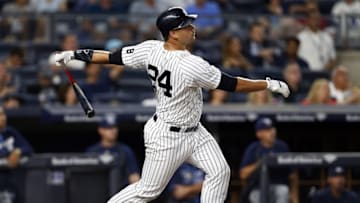 Sep 9, 2016; Bronx, NY, USA; New York Yankees catcher Gary Sanchez (24) hits a solo home run off of Tampa Bay Rays starting pitcher Blake Snell (4) during the third inning at Yankee Stadium. Mandatory Credit: Adam Hunger-USA TODAY Sports