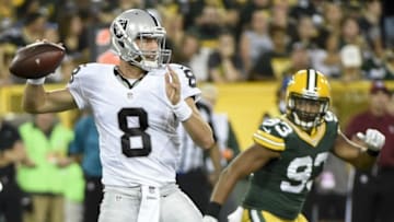 Aug 18, 2016; Green Bay, WI, USA; Oakland Raiders quarterback Connor Cook (8) throws a pass in the third quarter during the game against the Green Bay Packers at Lambeau Field. Mandatory Credit: Benny Sieu-USA TODAY Sports