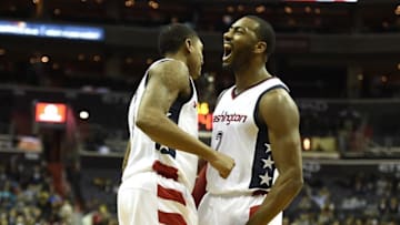 Dec 14, 2016; Washington, DC, USA; Washington Wizards guard John Wall (2) celebrates with guard Bradley Beal (3) after scoring during the fourth quarter against the Charlotte Hornets at Verizon Center. Washington Wizards defeated Charlotte Hornets 109-106. Mandatory Credit: Mandatory Credit: Tommy Gilligan-USA TODAY Sports