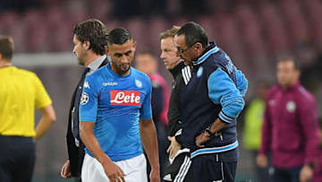 NAPLES, ITALY - NOVEMBER 01: Coach of SSC Napoli Maurizio Sarri and injured player Faouzi Ghoulam during the UEFA Champions League group F match between SSC Napoli and Manchester City at Stadio San Paolo on November 1, 2017 in Naples, Italy. (Photo by Francesco Pecoraro/Getty Images)
