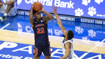 Auburn basketballFeb 13, 2021; Lexington, Kentucky, USA; Auburn Tigers guard Allen Flanigan (22) attempts a three-pointer while being guarded by Kentucky Wildcats guard Davion Mintz (10) during the first half of the game at Rupp Arena at Central Bank Center. Mandatory Credit: Arden Barnes-USA TODAY Sports