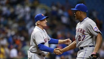 Aug 7, 2015; St. Petersburg, FL, USA; New York Mets manager Terry Collins (10) congratulates relief pitcher Jeurys Familia (27) after they beat the Tampa Bay Rays at Tropicana Field. New York Mets defeated the Tampa Bay Rays 4-3. Mandatory Credit: Kim Klement-USA TODAY Sports
