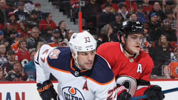 OTTAWA, ON - FEBRUARY 28: Mark Borowiecki #74 of the Ottawa Senators defends against Milan Lucic #27 of the Edmonton Oilers at Canadian Tire Centre on February 28, 2019 in Ottawa, Ontario, Canada. (Photo by Andre Ringuette/NHLI via Getty Images)