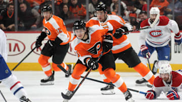 PHILADELPHIA, PA - MARCH 19: Travis Konecny #11 of the Philadelphia Flyers skates the puck with Ivan Provorov #9 and Michael Raffl #12 against Paul Byron #41 and Nate Thompson #21 of the Montreal Canadiens on March 19, 2019 at the Wells Fargo Center in Philadelphia, Pennsylvania. (Photo by Len Redkoles/NHLI via Getty Images)