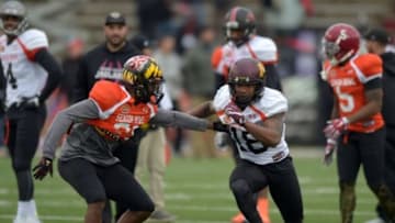 Jan 27, 2016; Mobile, AL, USA; South squad safety Sean Davis of Maryland (21) defends as South squad wide receiver K.J. Maye of Minnesota (18) tries to run a route in a drill during Senior Bowl practice at Ladd-Peebles Stadium. Mandatory Credit: Glenn Andrews-USA TODAY Sports