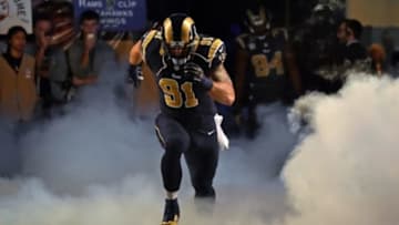 Sep 13, 2015; St. Louis, MO, USA; St. Louis Rams defensive end Chris Long (91) runs onto the field prior to the game against the Seattle Seahawks the Edward Jones Dome. Mandatory Credit: Jasen Vinlove-USA TODAY Sports