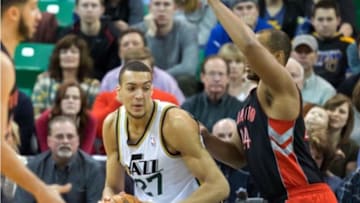 Feb 3, 2014; Salt Lake City, UT, USA; Toronto Raptors power forward Chuck Hayes (44) defends against Utah Jazz center Rudy Gobert (27) during the first half at EnergySolutions Arena. Mandatory Credit: Russ Isabella-USA TODAY Sports