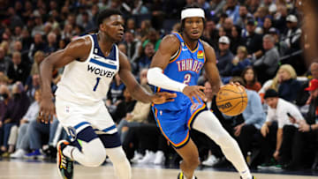 OKC Thunder guard Shai Gilgeous-Alexander (2) drives to the basket against Timberwolves forward Anthony Edwards (1) : Matt Krohn-USA TODAY Sports