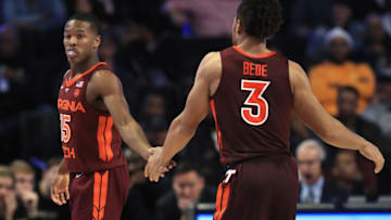 WINSTON-SALEM, NORTH CAROLINA - JANUARY 14: Teammates Jalen Cone #15 and Wabissa Bede #3 of the Virginia Tech Hokies react against the Wake Forest Demon Deacons during their game at LJVM Coliseum Complex on January 14, 2020 in Winston-Salem, North Carolina. (Photo by Streeter Lecka/Getty Images)